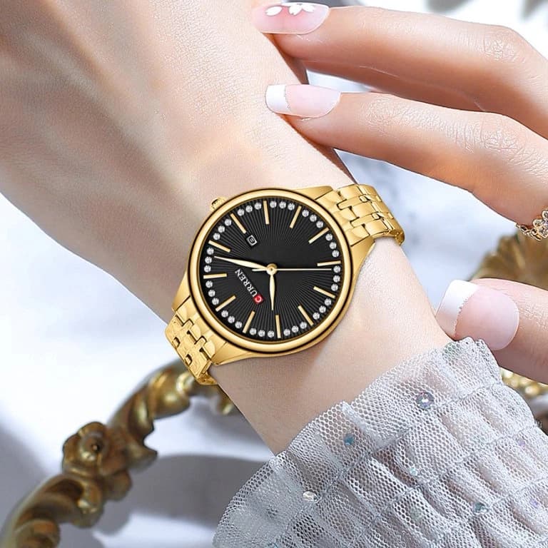 Montre tendance femme Curren avec date bracelet en acier water resistant 30m